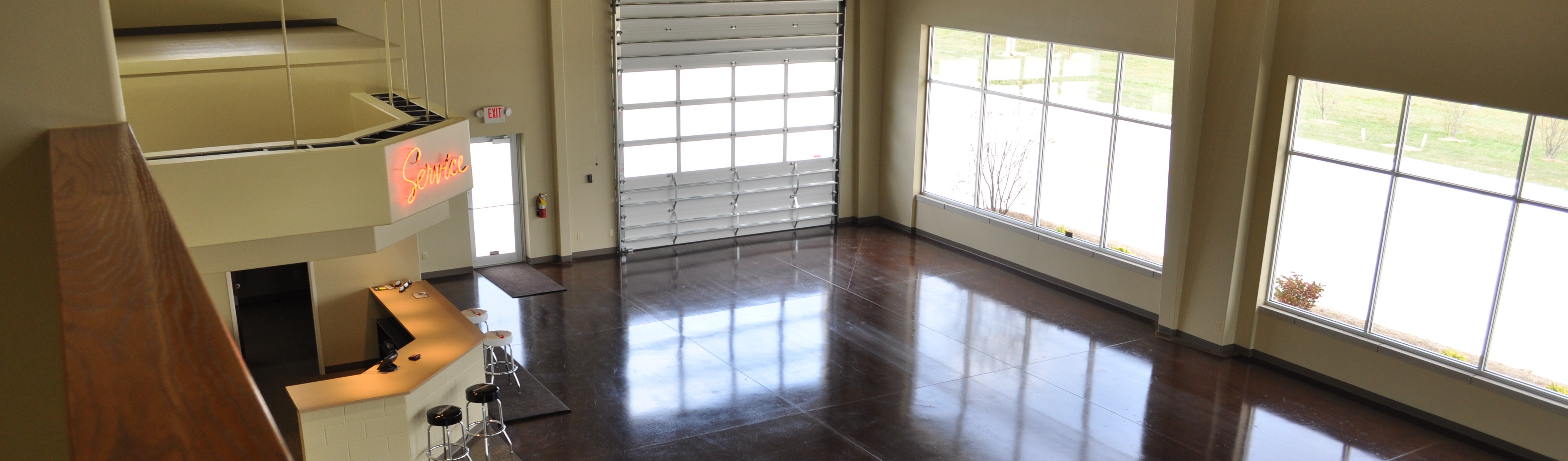 Interior of automotive service center build-out with polished concrete floor