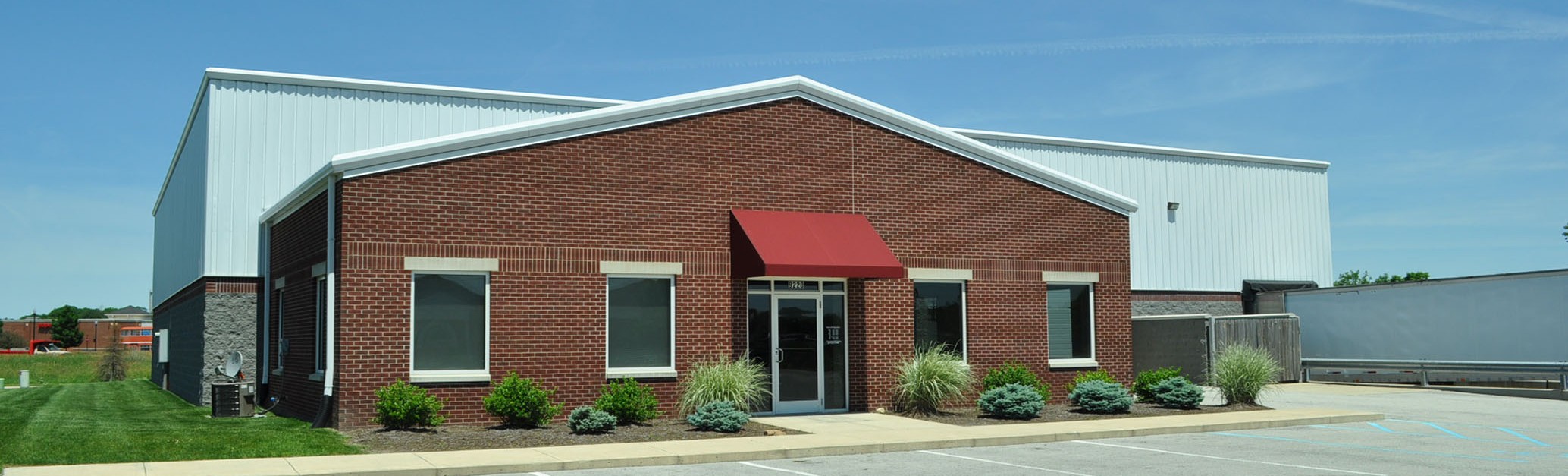 Brick office entrance and metal warehouse building by Systems Builders, Indianapolis